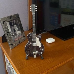 Mini Gretsch guitar with stand